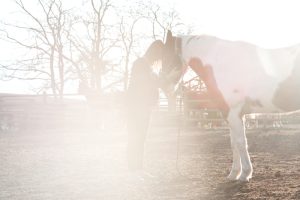 picture of a pregnant woman with a horse who knows about getting pregnant with PCOS