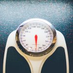 picture of a scale to weight yourself with pcos weight gain, pcos belly fat, and to lose weight with pcos