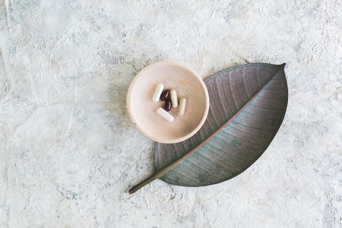 picture of a bowl with the supplement NAC for PCOS